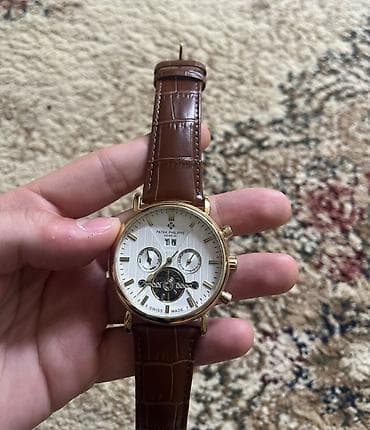 gun eynəyi: Patek Philippe Geneve qol saatı (MEXANİKA) Təmiz mexanikadır — 2