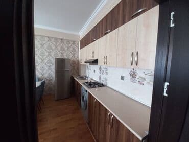 iki mertebe evler: Sumqayıt şəhəri,9mkrda,Krstal Abşeronda,16cı mərtəbədə,2 otaq stdyo — 5