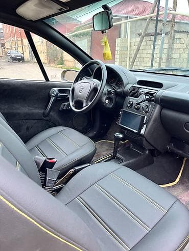 chery tiggo nece masindir: Opel Tigra: 1.4 l | 1997 il 192907 km Kupe — 5