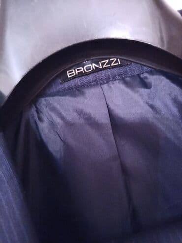 göy rəngli kişi cemperləri: Türkiyə istehsalı Kişi kastyum şalvarı. Razmer : 50.Rəng Tünd göy — 10