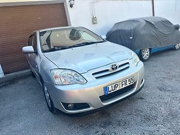 corolla cros: Toyota Corolla (E120) hatchback – gümüşü rəng Texniki və dizayn — 4