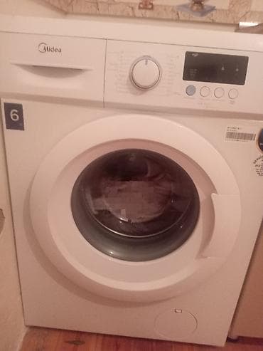 Peyk antenalarının quraşdırılması: Midea önyükləməli paltaryuyan maşın - Baraban həcmi: 6 kq (gövdədə “6 — 1