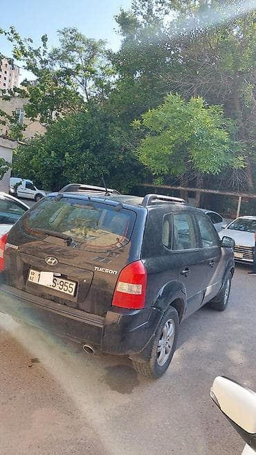 Hyundai Tucson, qara rəng, 5 qapılı SUV. İli 2006-nın sonu(2007 — 9