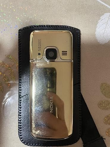 nokia 6700 satilir: Nokia 6700 Slide, rəng - Qızılı, Düyməli — 1