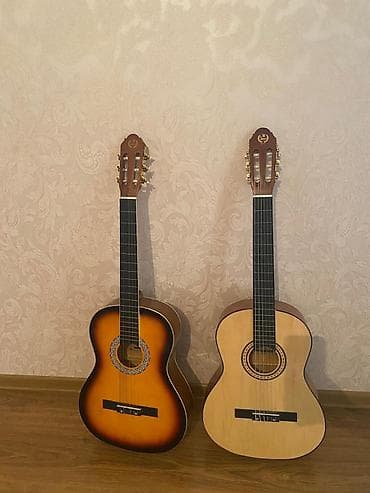 gitara balaca: Gitara alinib istifade edilmeyib tezedi ciziqda yoxdu her biri 170 azn — 2