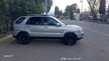 elektrik scooter qiymetleri: Kia Sportage 2008 - Kuzov: 5 qapılı SUV, relslərlə dam, arxa şüşələr — 7