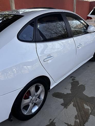 soyuducu maşınlar: Hyundai Elantra: 1.6 l | 2009 il Sedan — 7