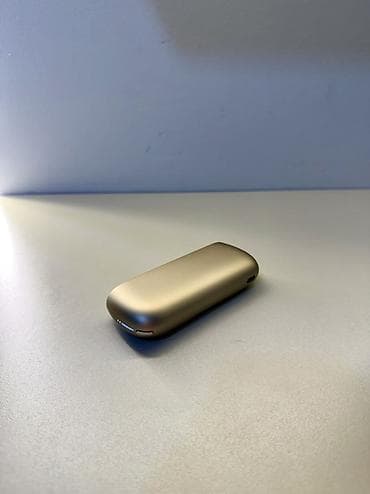 qizil sepler: IQOS cihazı – tütün qızdırma sistemi Məhsulun tərkibi: - Qızdırıcı — 2