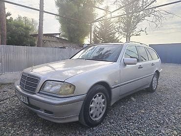 opel astra k: Mercedes-Benz C‑Class Universal (W202) – gümüş rəngli stansiyon vaqon — 3
