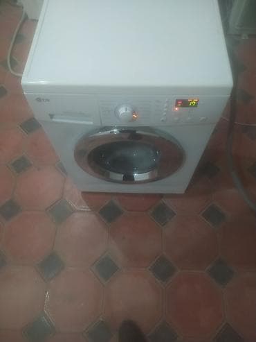 LG önyükləməli paltaryuyan maşın - Drum həcmi: 6 kq (Direct Drive