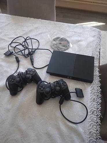 ps4 oyun yukleme: PlayStation 2 2 qolu var yaxşı vəziyyətdədir. Məzmun: - PS2 Slim — 1