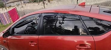 daewoo nexia 2010: Toyota Prius (2-ci nəsil) hibrid hetçbek - Rəng: qırmızı - Kuzov: 5 — 3