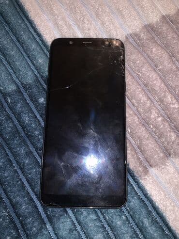 mi 12 t: Smartfon – qara rəngli, nazik korpus. Xüsusiyyətlər: - Sensorlu ekran — 5