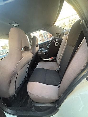 kovs: Subaru Impreza: 2 l | 2007 il 301000 km Sedan — 8