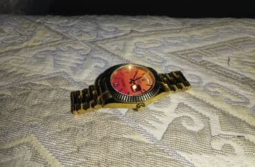 apple watch 8: Qızılı rəngli qol saatı - Korpus və qolbaq: metal, qızılı rəng — 2