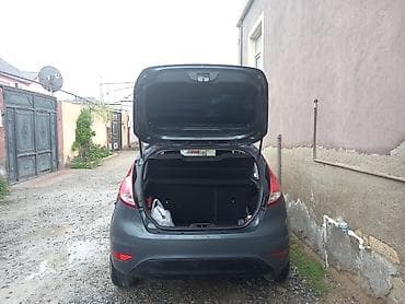 opel astra 2012: Ford Fiesta hatchback — tünd boz rəng, 5 qapı. Xüsusiyyətlər: - — 2