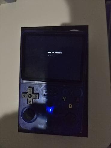 nintendo switch kontakt home: Daşınan Retro Oyun Konsolu – mavi şəffaf korpus Xüsusiyyətlər: - — 7