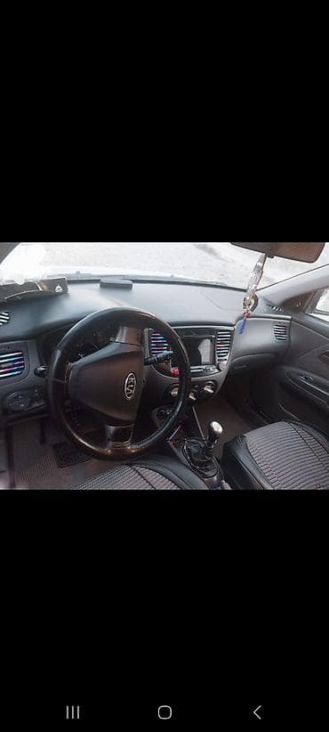 lada priora universal: Kia Rio: 1.5 l | 2007 il Hetçbek — 9
