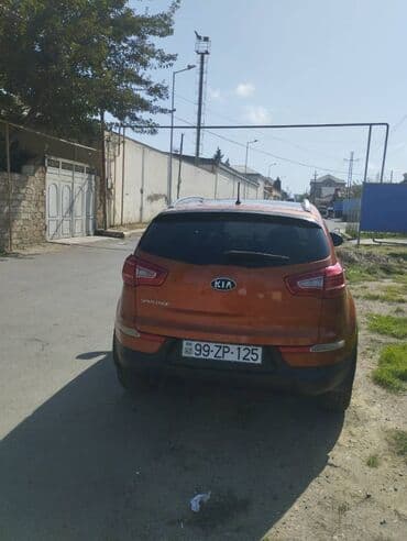 qadın üçün maşınlar: Kia Sportage: 2 l | 2011 il Ofrouder/SUV — 3