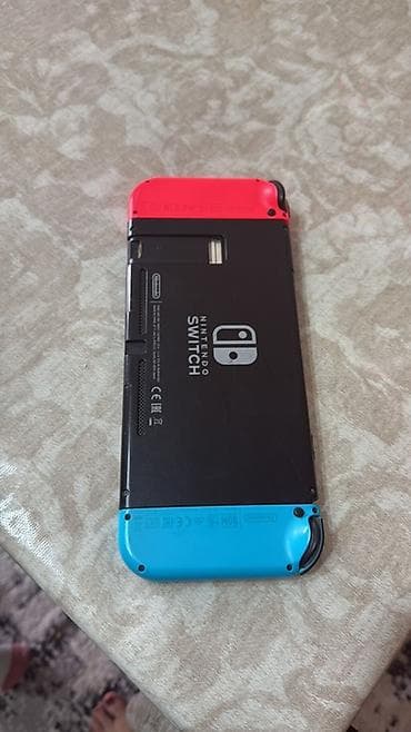 сколько стоит nintendo switch: Nintendo Switch konsolu – Neon Red/Neon Blue Joy-Con - Daşımaq üçün — 1