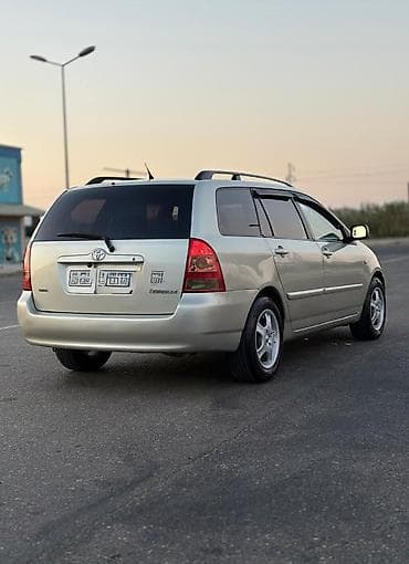 volkswagen polo 1: Toyota Corolla: 1.4 л | 2006 г. Универсал — 4
