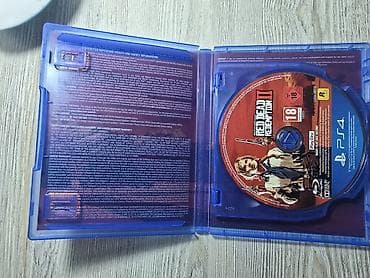 dvd disk: Red Dead Redemption 2 (PS4) / İdeal vəziyyətdə ​Qiymət: ​38 AZN Red — 2