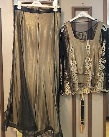 qiz kurtkasi: Zərif şıq ziyafət dəsti – 3 hissədən ibarət: - Qızılı parıltılı maxi — 2