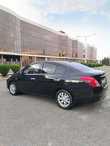 tesla model s: Nissan Sunny: 1.3 l | 2012 il Sedan — 3
