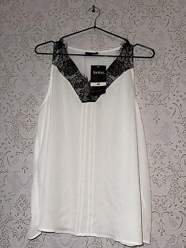 ağlar: Brend: Janina Model: Qolsuz bluz Ölçü: 40 (etiket üzərində göstərilib) — 2