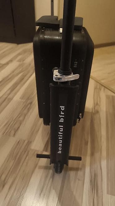 scooter icaresi: Elektrikli skuter‑çemodan (rideable luggage) - 2‑i 1‑də dizayn — 1