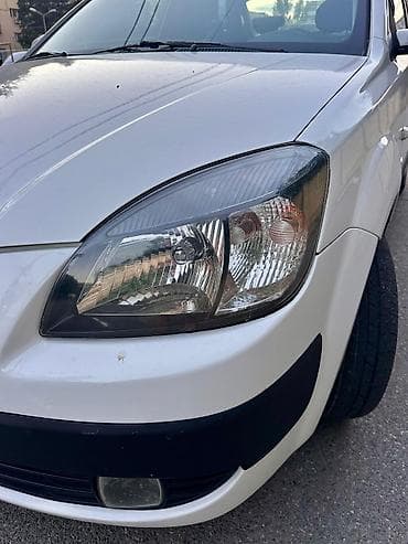 vaz 2107 abilsofka: Kia Rio, 2009 – dizel, avtomat Xüsusiyyətlər: - Kuzov: sedan, ağ rəng — 7