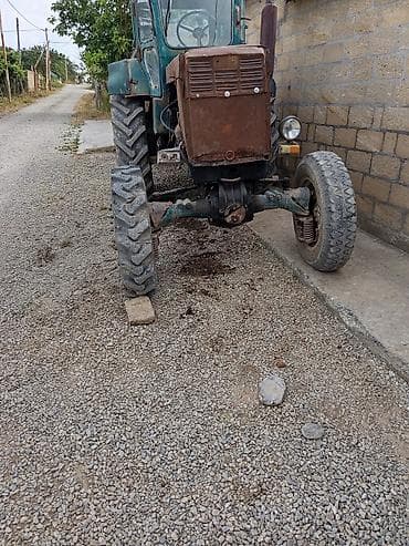 Kənd təsərrüfatı üçün təkərli traktor - Ön təkərli idarəetmə, iri