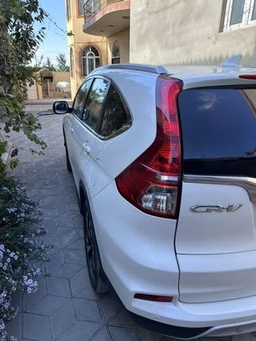 дом на колесах turbo az: Honda CR‑V, ağ rəng, 4x4 (AWD) Kuzov: şəhər krossoveri, aerodinamik — 5