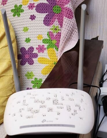 adsl modem: TP-LINK ADSL modem. İki antenalı sürət 300 mbs. Təzə kimi qalıb — 2