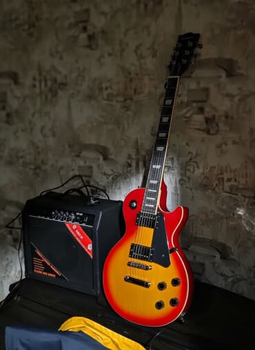 Salam, Kaysen Les Paul elektro gitarasıdır. Üstündə Florida TG-25 lalafo.az -da Salam, Kaysen Les Paul elektro gitarasıdır. Üstündə Florida TG-25