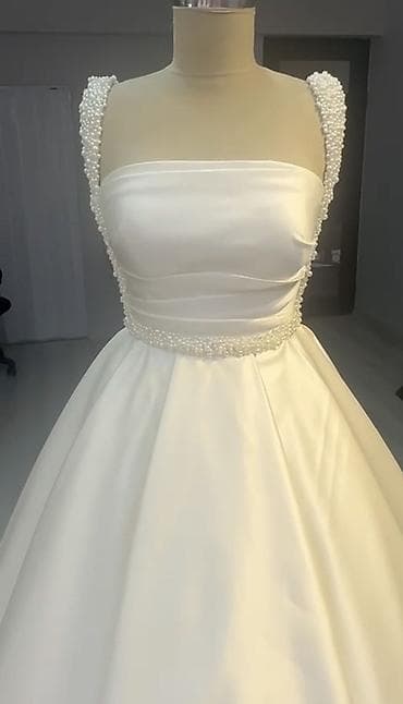 korsa: Gəlinlik – klassik “ball gown” siluetli, atlas parça. - Rəng: İvori/ — 3