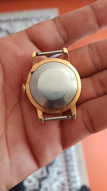 qizil saatlar: Məhsul: Mexaniki qol saatları (2 ədəd) 1) Raketa – 16 JEWELS - — 3