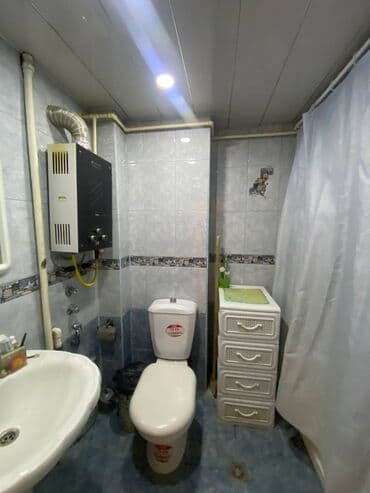 ucuz bina evləri: Yasamal rayonu (77 dayanacağın sonu) yeni tikili 22 mertebeli binanın — 15