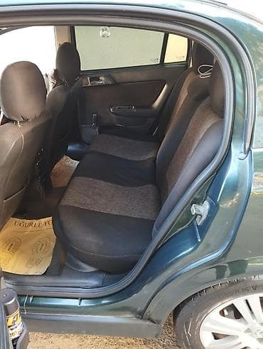 lada vaz 2101: Opel Astra: 1.6 l | 1999 il 400 km Sedan — 5
