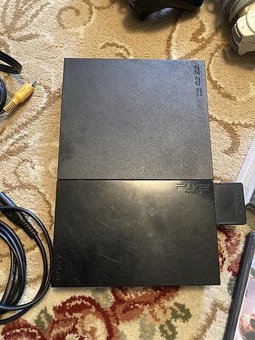 Sony PlayStation 2 Slim (PS2) oyun konsolu Xüsusiyyətlər: - Model