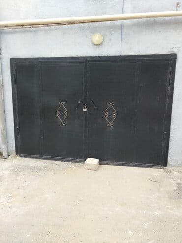 qaraj qapı: Metal qaraj qapısı. Qalın metaldan hazırlanmış, iki taylı konstruksiya — 2