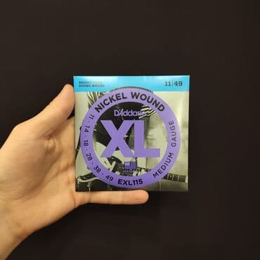 ucuz gitaralar: Elektro gitara simləri Daddario EXL115 Həm yeni başlayanlar, həm — 1