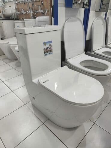 ucuz unitaz: Ağ rəngdə, müasir dizaynlı unitaz. Caesar markasına məxsusdur. Hamam — 1