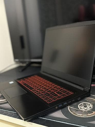 en ucuz mac: MSI oyun noutbuku - Model: MSI (qara korpus, qırmızı ejder loqosu və — 2