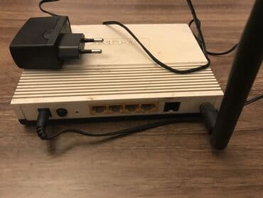 tp link modem qiymetleri: TP-Link şirkətinin simsiz G ADSL2+ modem routeri. Kompakt dizaynı ev — 2