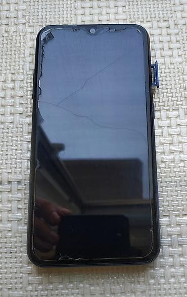 Samsung Galaxy A01, 16 ГБ, цвет - Синий, Сенсорный, Отпечаток пальца, Две SIM карты — 4