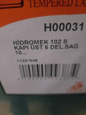 Hidromek 102 qapı şüşesi