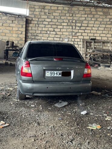 lassa teker 13: Hyundai Accent sedan - Kuzov: 4 qapılı sedan, tünd boz rəng - — 2