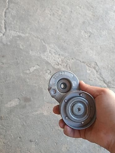 pec matoru: Avtomobil üçün kəmər gərginləşdirici rolik mexanizmi satılır. Şəkildə — 1