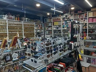 Çoxçeşidli aksesuar və kosmetika mağazası - Gün eynəkləri: Kişi və